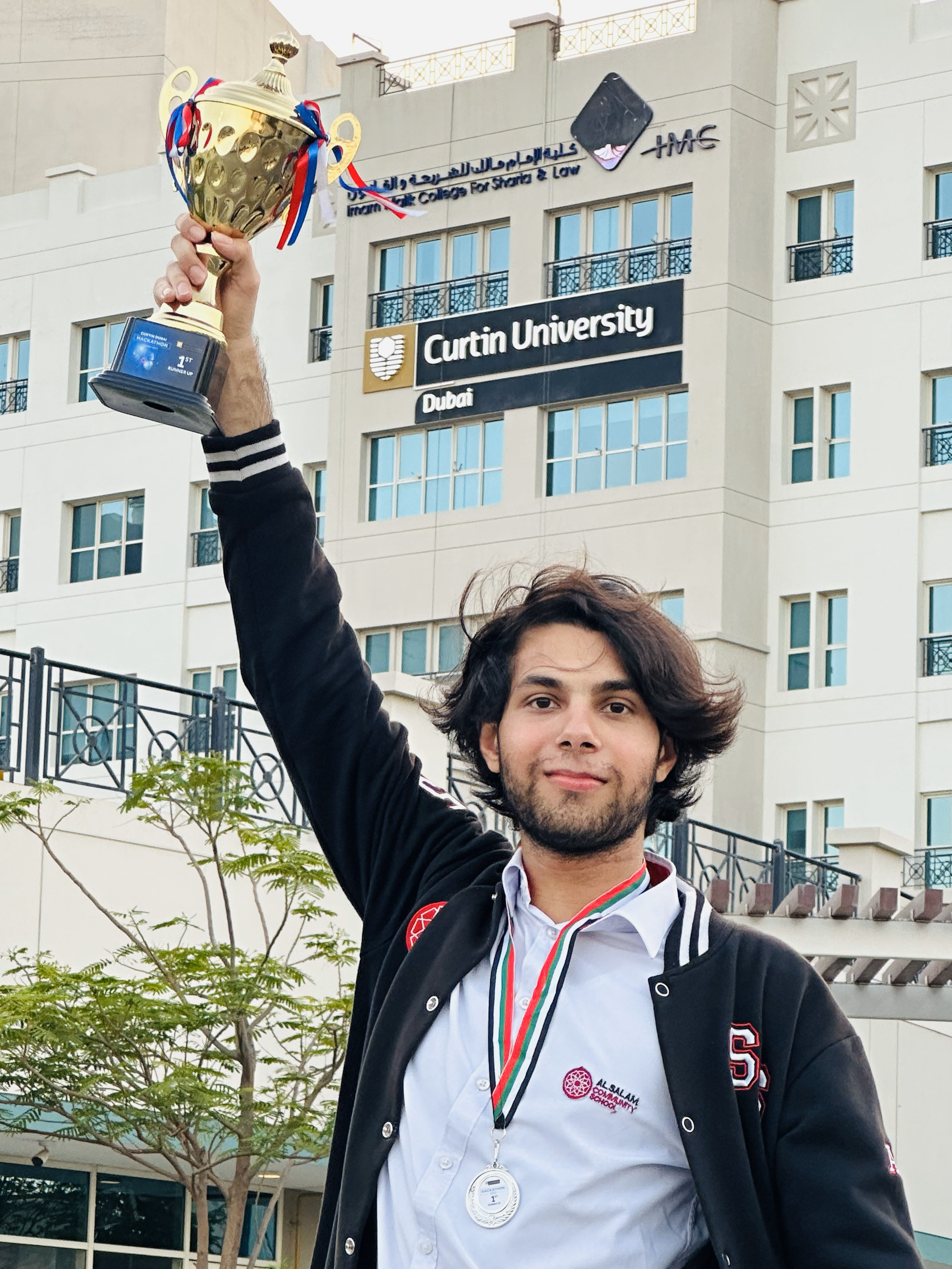 Me holding trophy at Curtin University